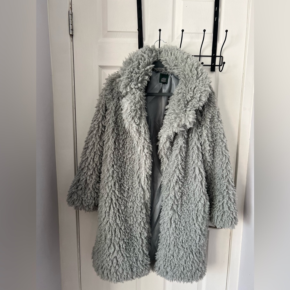 Mid length light gray blue collared jacket.
